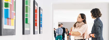 2_women_viewing_artwork_in_gallery-1