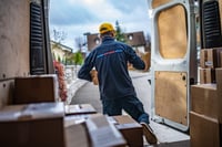 a delivery driver inside a delivery vehicle