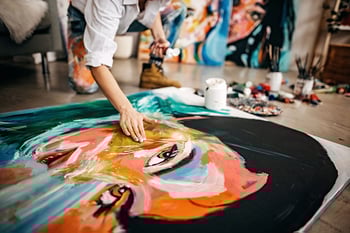 artist finishing portrait