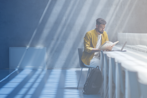 Student at desk reading