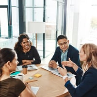 shot-of-a-group-of-businesspeople-having-a-meeting-in-an-office-800x800